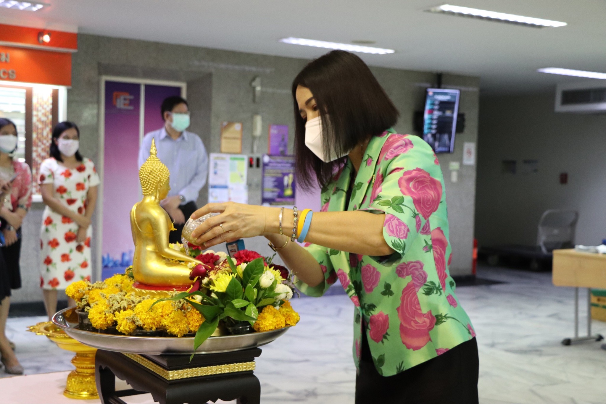 OIE Management and Staff Join the Sprinkle Water onto a Buddha Image Ceremony on Songkran Festival 2022
